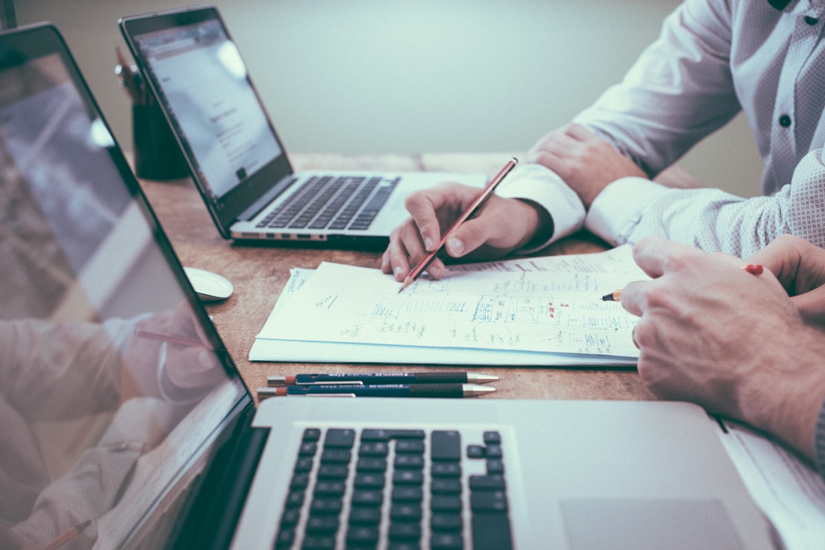 Advisor reviewing retirement cash-flow notes at a desk
